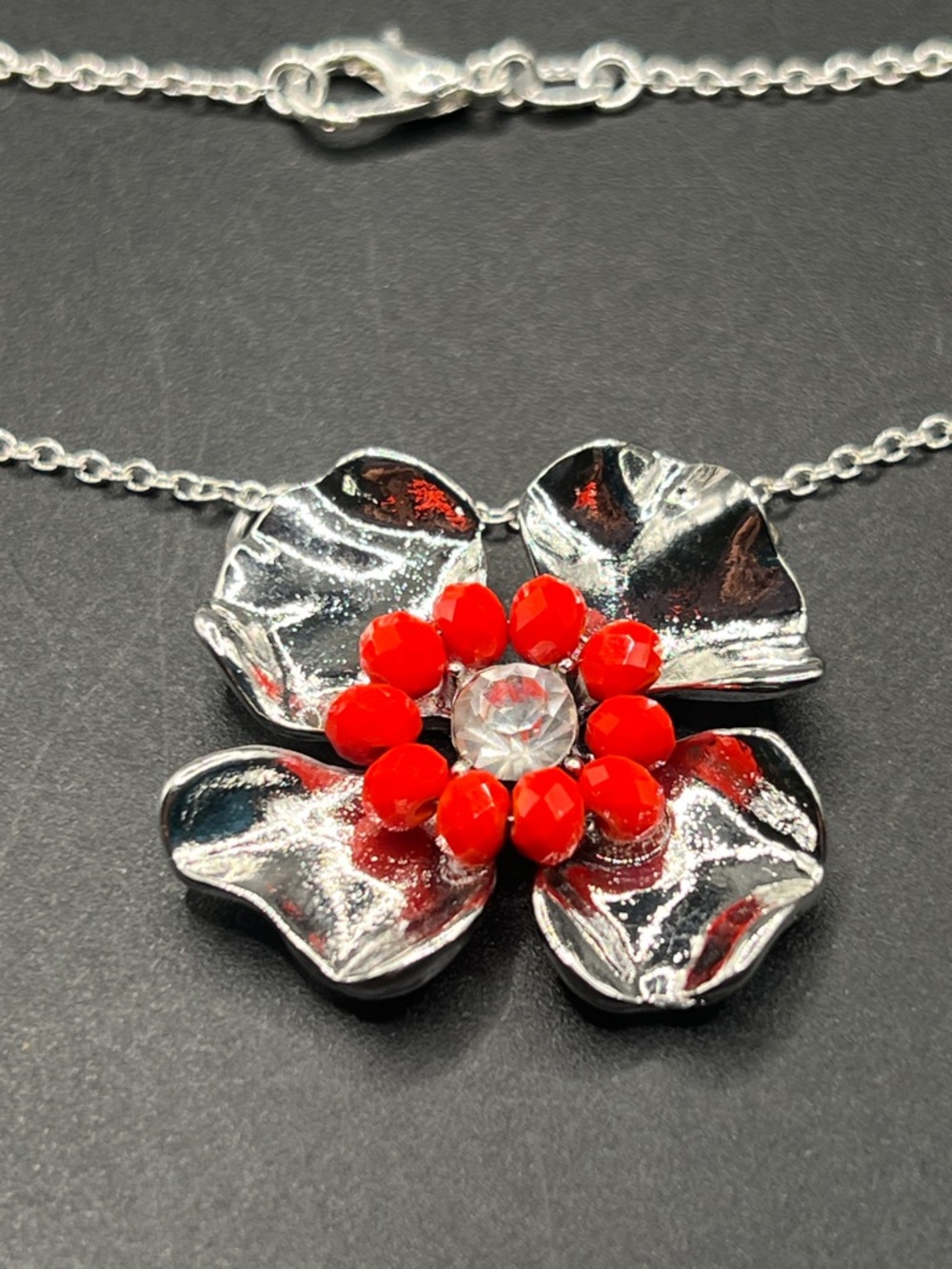 Silver Floral Pendant Necklace with Red Accents